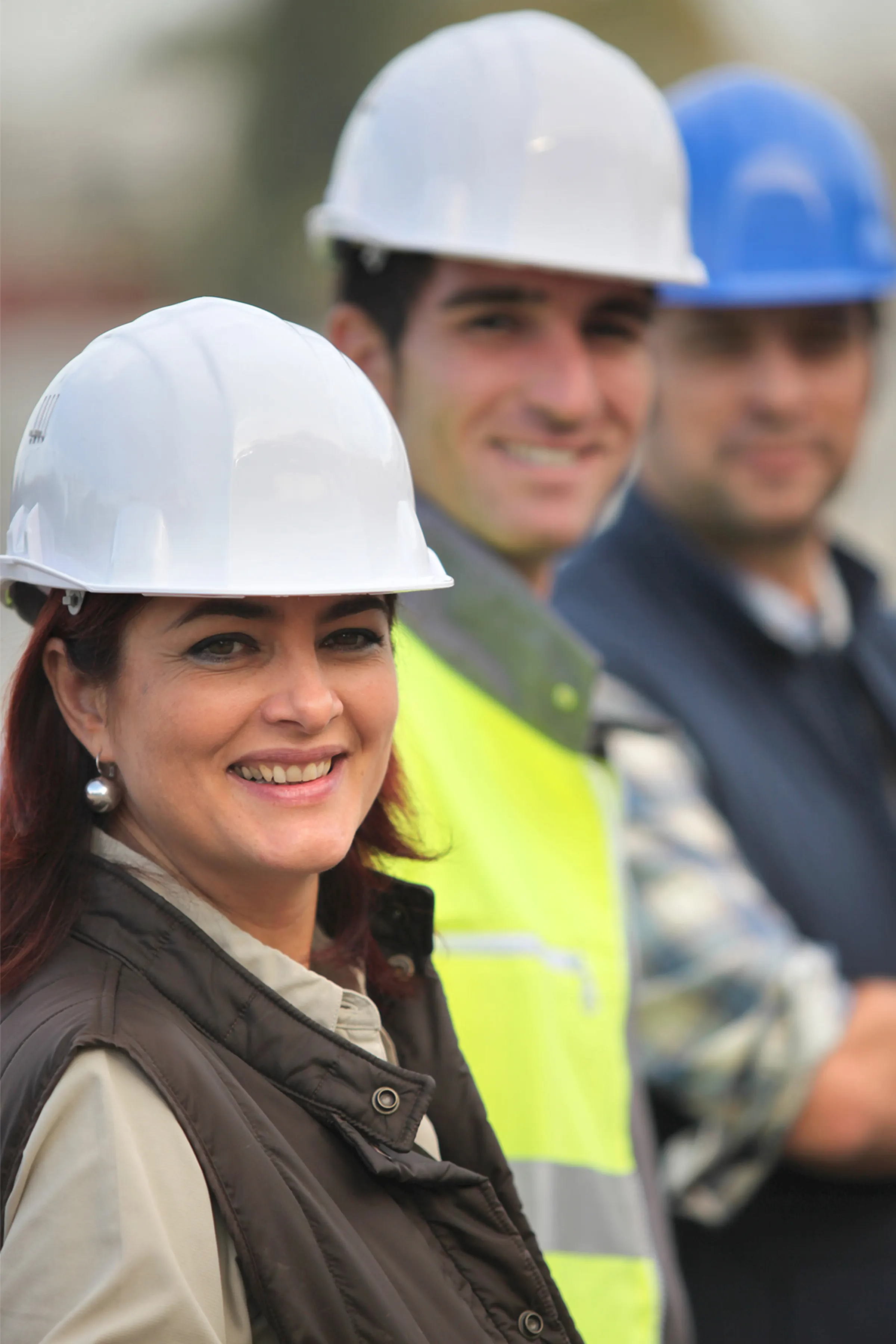 Leadership team of a home services business on site at a construction project