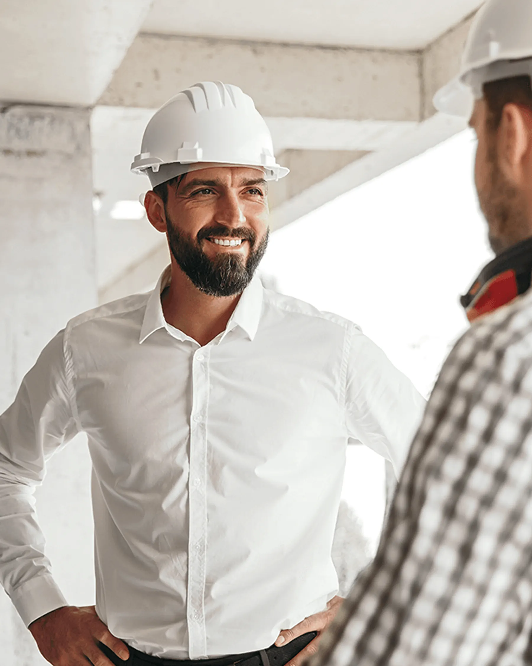 Owner speaking with construction team lead at site