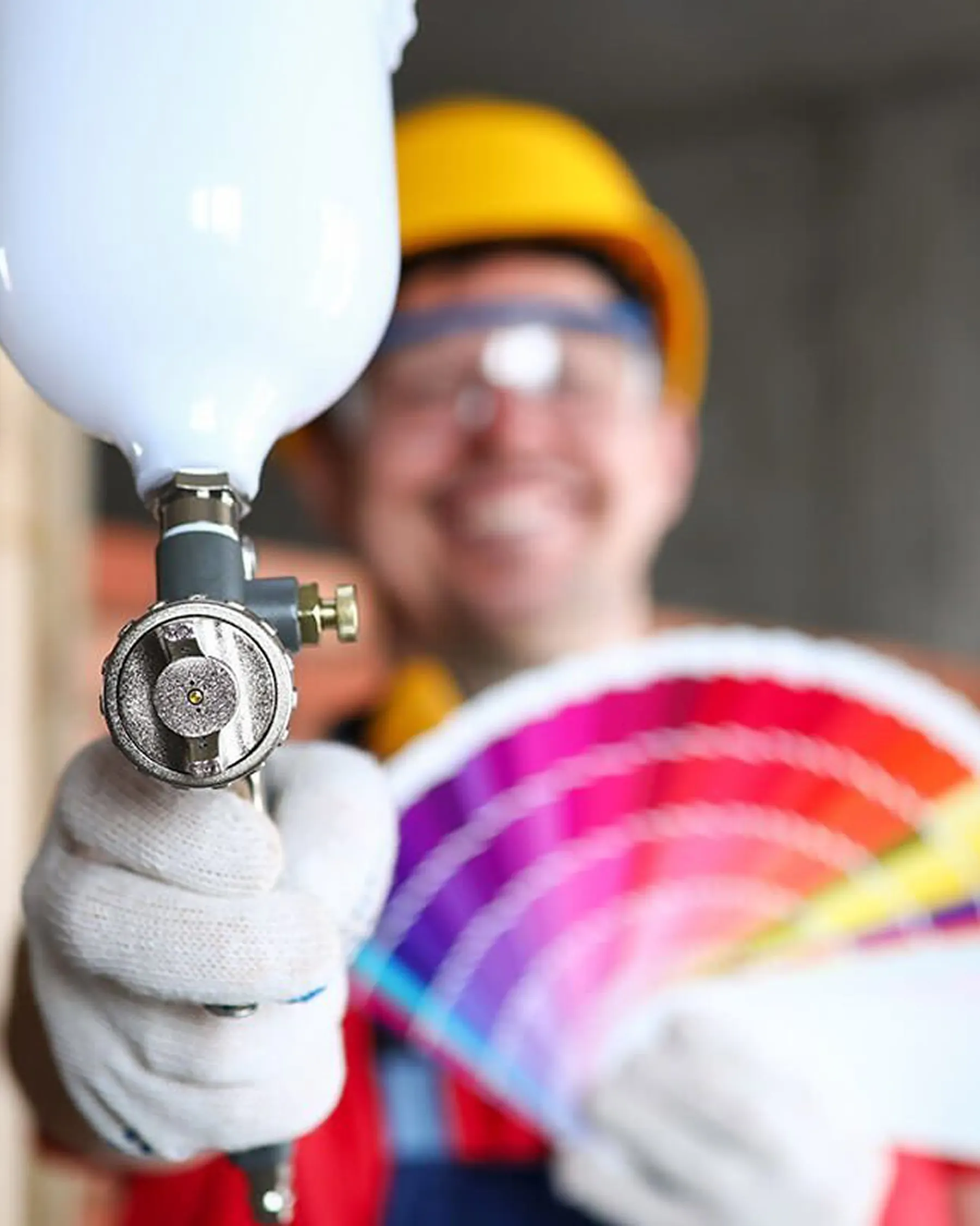 Commercial painter with color wheel and spray gun