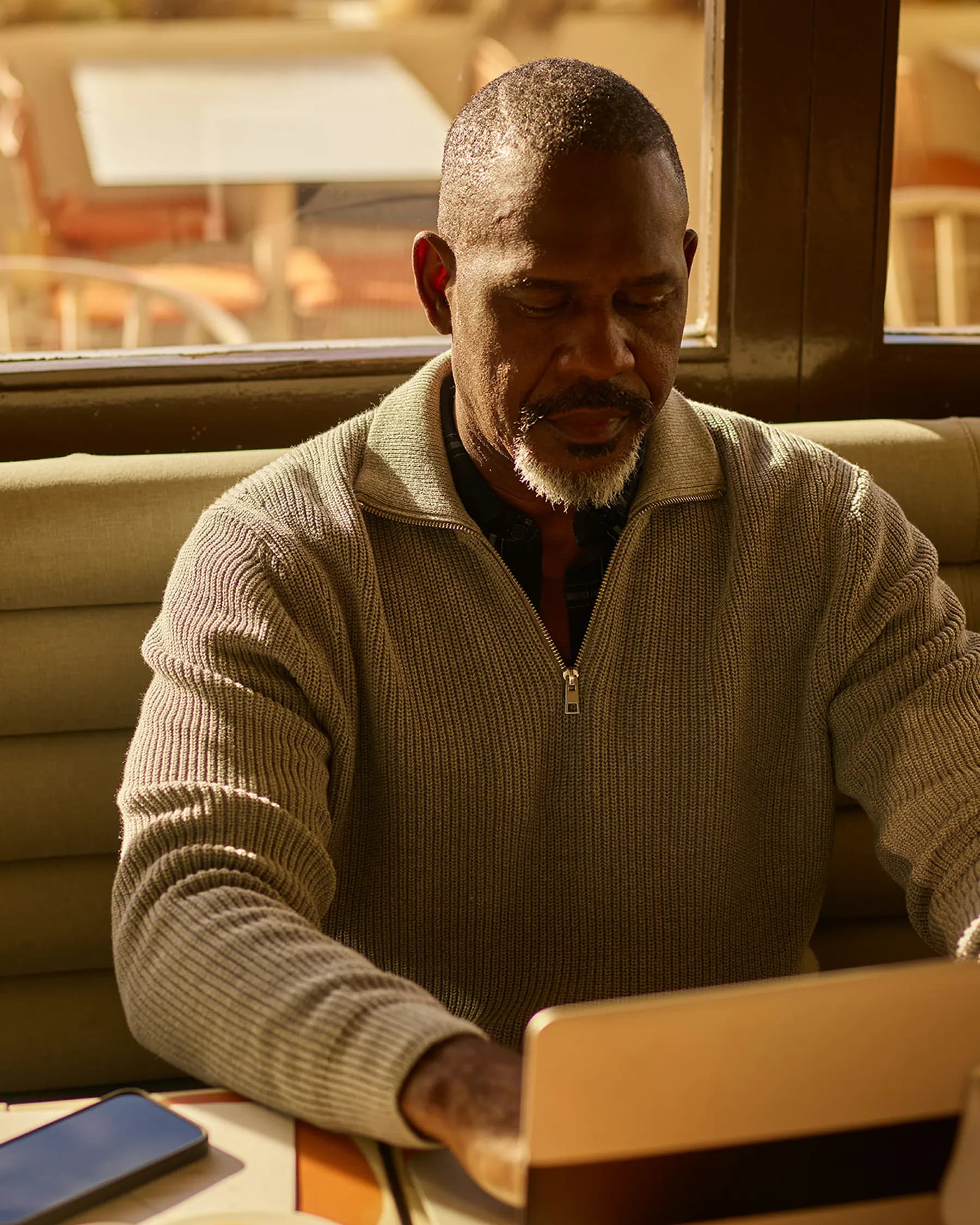 Man searching internet for recommendations on home service provider