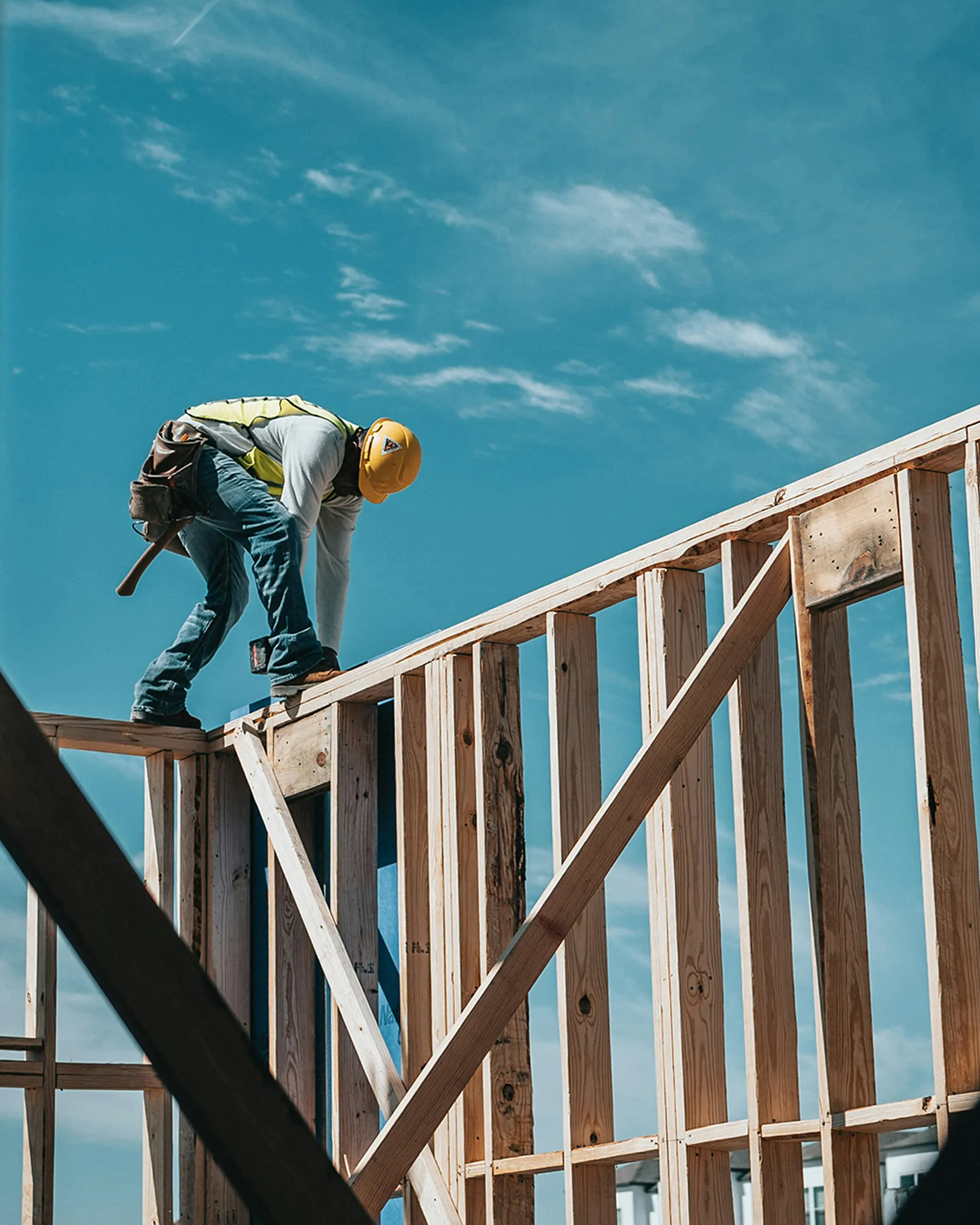 Contractor taking jobsite notes on a clipboard