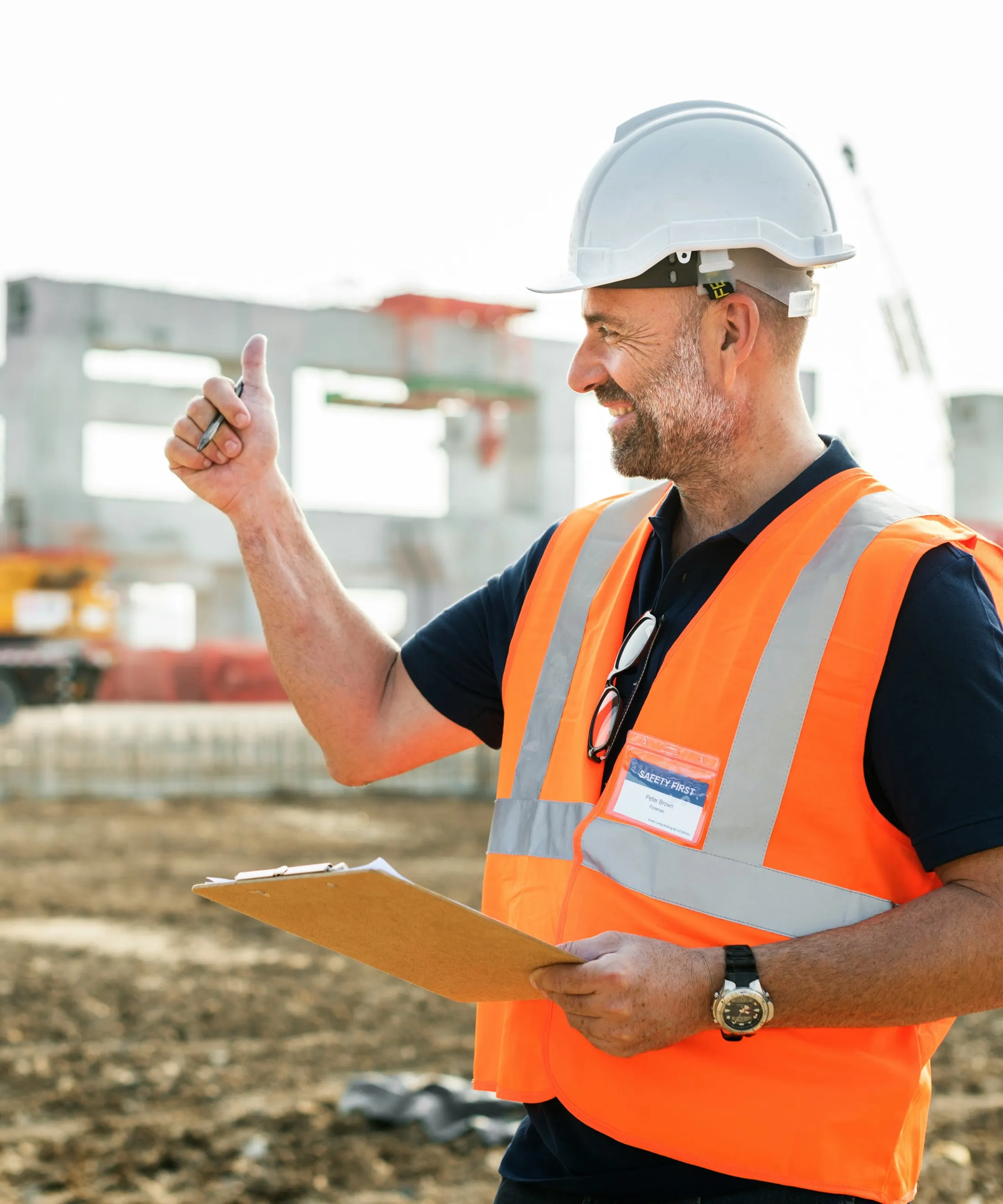 Field supervisor documenting work in a commercial space